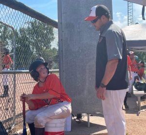 Ian Coaching His Son's Baseball Team